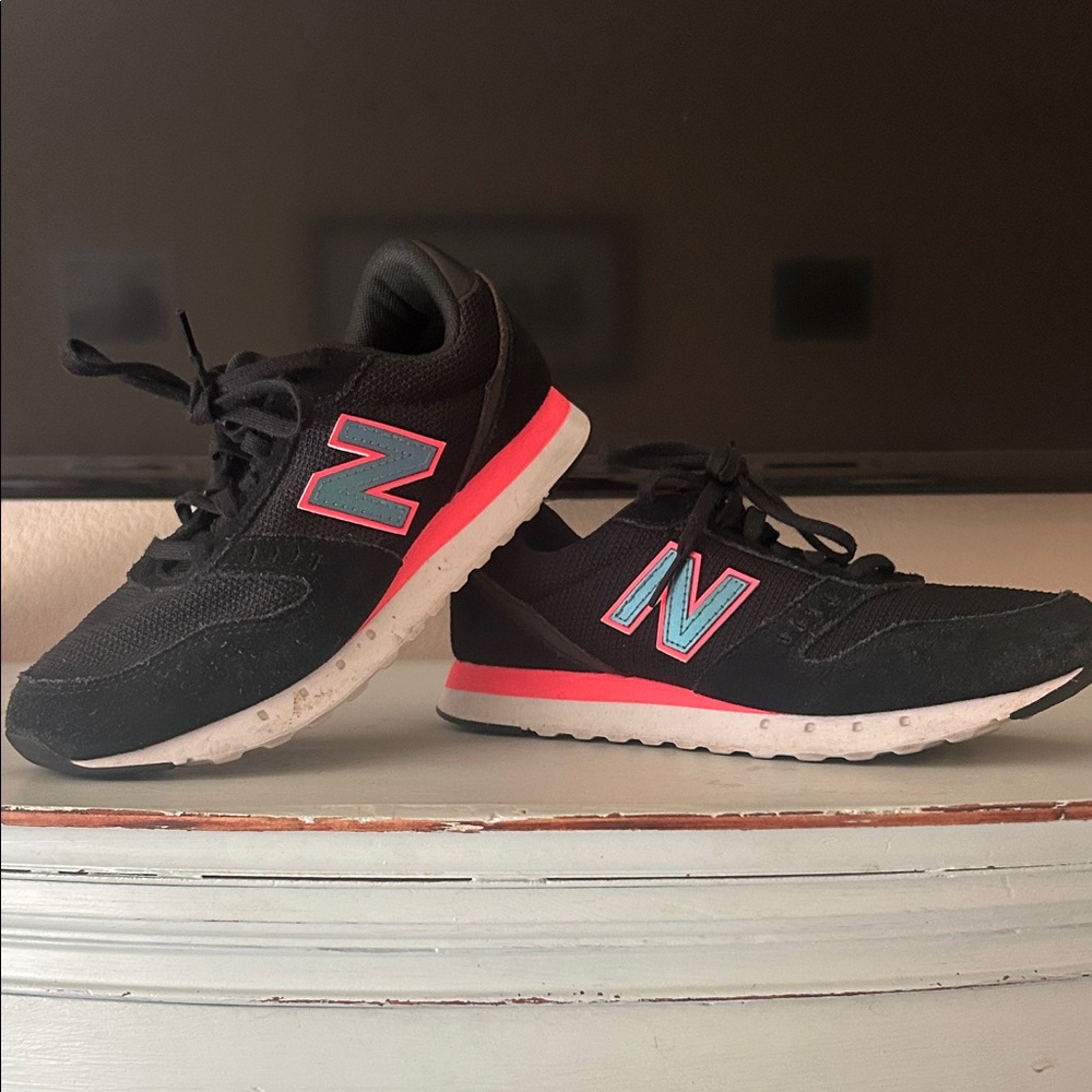 New Balance Womens Black Sneakers with Pink Accents